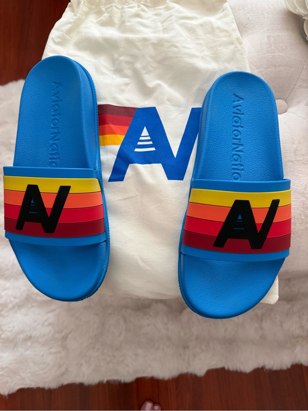 Aviator Nation Bright Blue Slides with Rainbow Stripe Strap